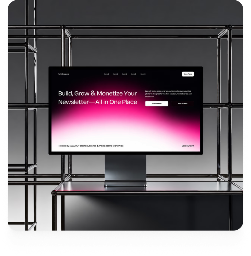 Inkwave website displayed on a monitor in a metallic studio setting